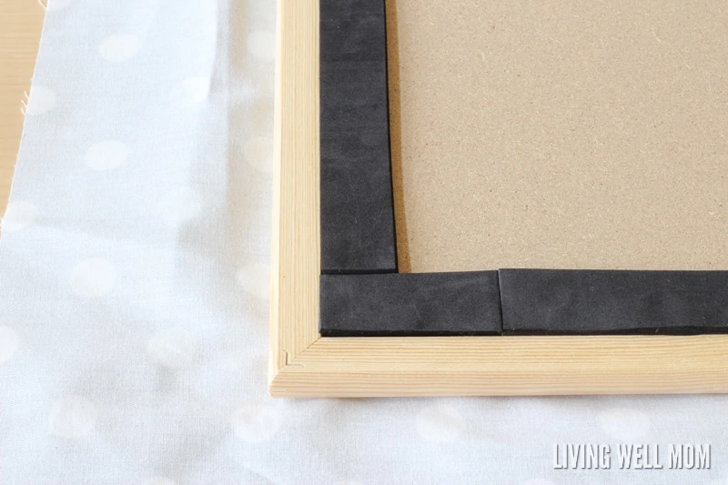 This simple DIY Cork Board is easy to make, inexpensive, and pretty too! Get easy step-by-step instructions here: