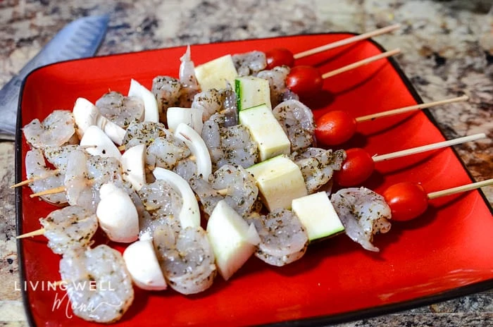 Assembled garlic lemon shrimp skewers ready for the grill