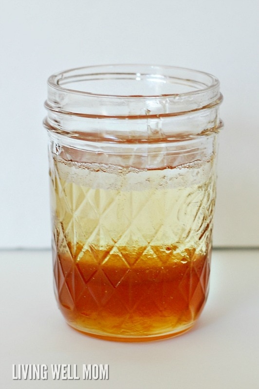 homemade honey face wash ingredients separating in a mason jar
