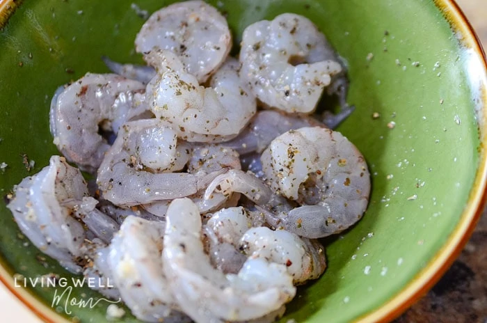 raw seasoned shrimp in a bowl