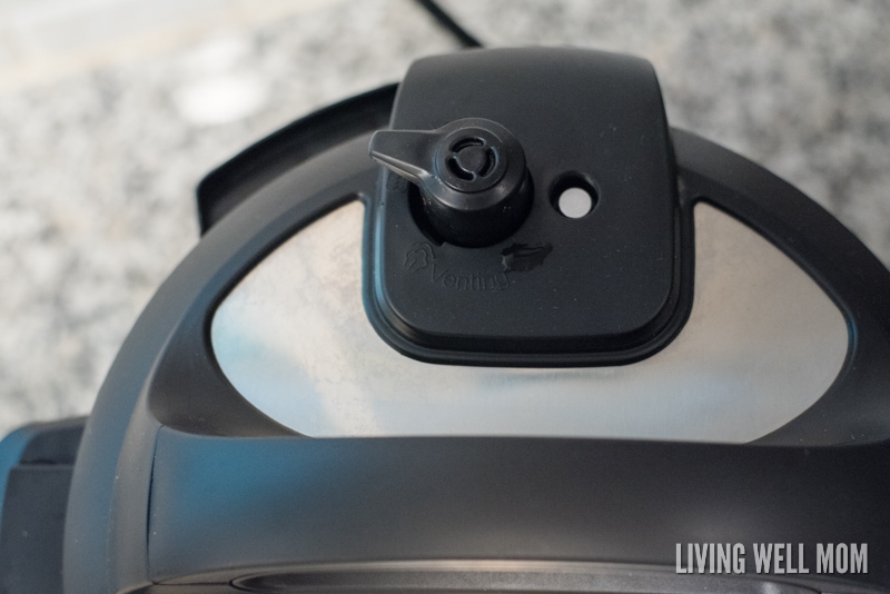 Close up of a pressure release valve on top of an instant pot. 