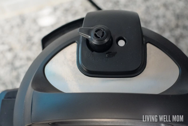 Close up of a sealed pressure release valve on top of an instant pot. 