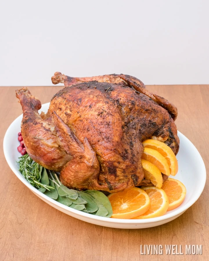 Orange Herbed Turkey with Spiced Rub - with savory herbs and spices, this recipe results in a mouthwatering tender bird so delicious everyone will want seconds or thirds! It's simple to make with only a little more prep time compared to a basic Thanksgiving turkey.