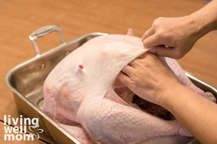 opening up turkey for seasoning