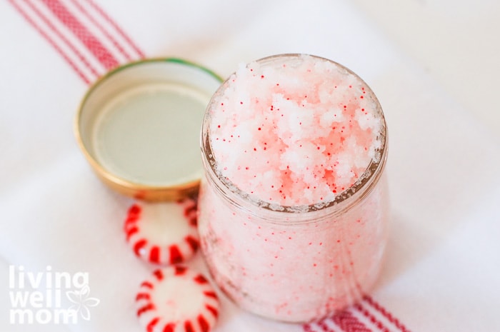 white and red peppermint body scrub in jar