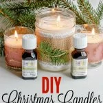 DIY candles made in mason jars next to essential oils