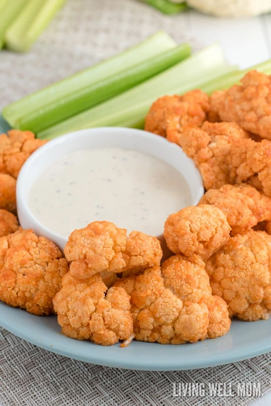 With coconut oil and dairy-free ingredients, Paleo Buffalo Cauliflower is a mouthwatering snack and appetizer you can feel good about eating!