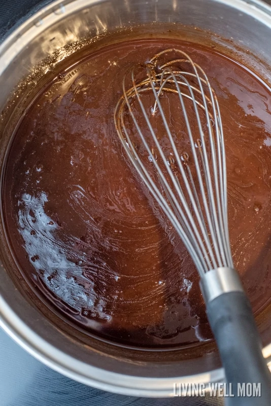 stirring chocolate mixture on the stovetop