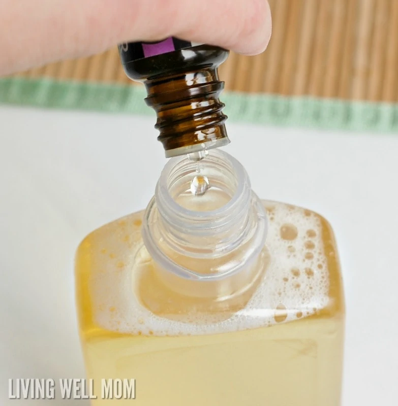 essential oil drops into plastic soap container