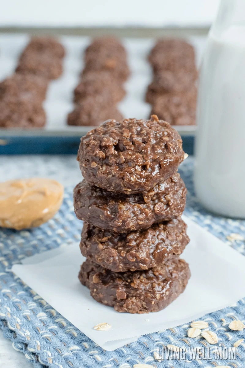 oatmeal based treats stacked on a piece of parchment paper