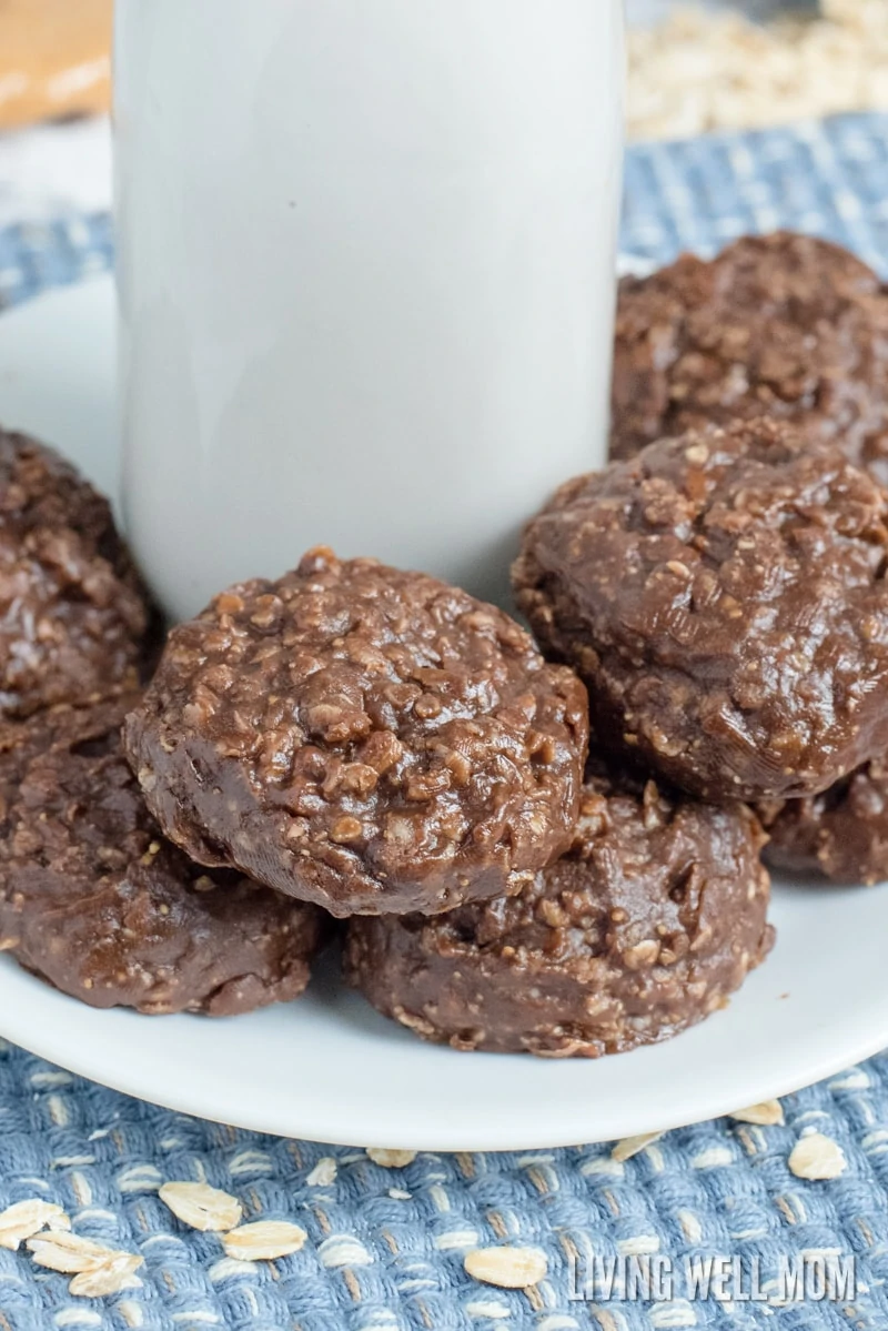 a glass of milk surrounded by no-bake cookies