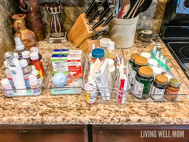 medicine containers in plastic bins