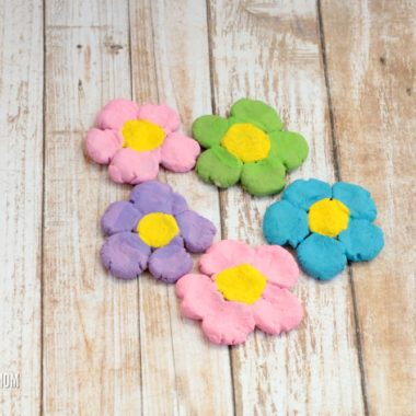 These delightful salt dough flowers are the perfect way to preserve your children's fingerprints in a fun, spring-themed project! Kids will love these!