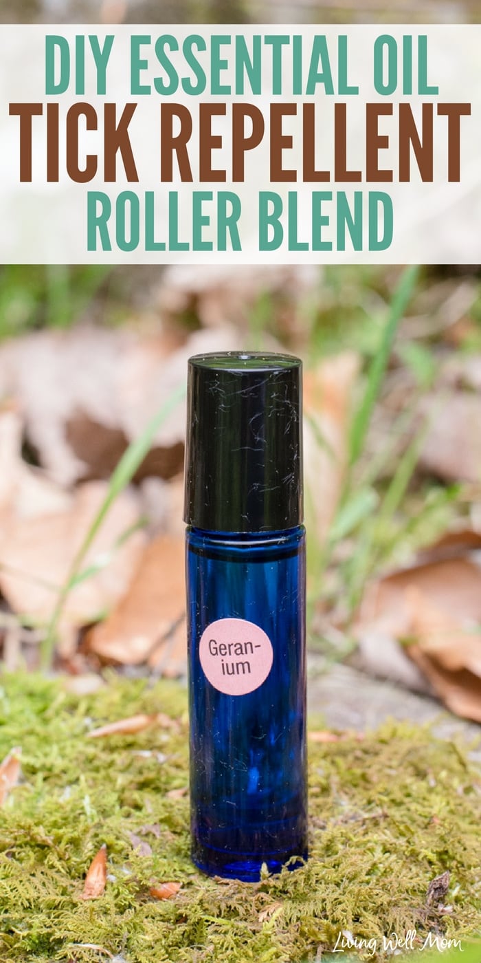 glass essential oil roll-on bottle with geranium label for tick repellent with woods leaves moss background