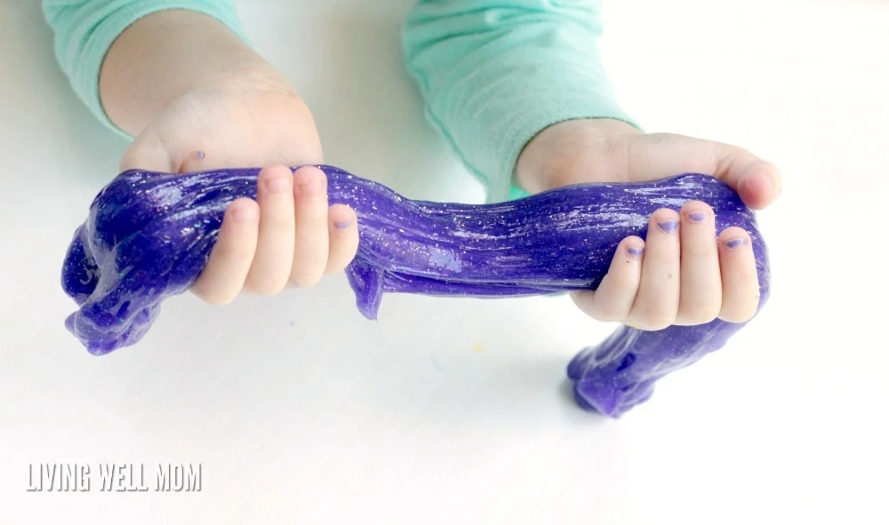 You only need 3 ingredients to make Glitter Glue Slime! Kids will love this fun, stretchy STEM activity!