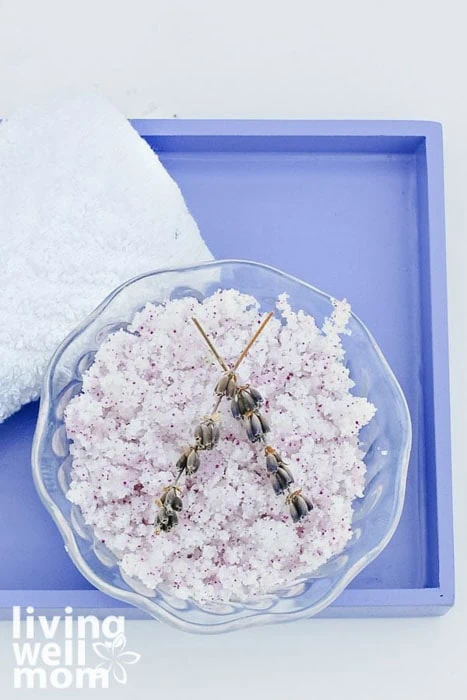 lavender sprigs on top of homemade sugar scrub