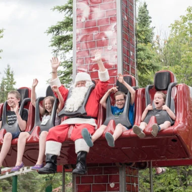 16 Reasons Why You Need to Take Your Family to Santa's Village in Jefferson, NH - from meeting Santa himself to feeding his reindeer, fun roller coasters and an awesome watermark, Santa's Village is an amazing family attraction the whole family will love!