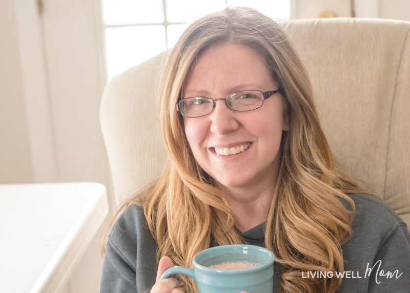 Erika Bragdon holding a cup of coffee