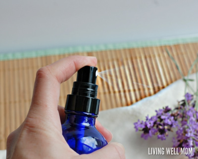 Woman spraying diy essential oil spray