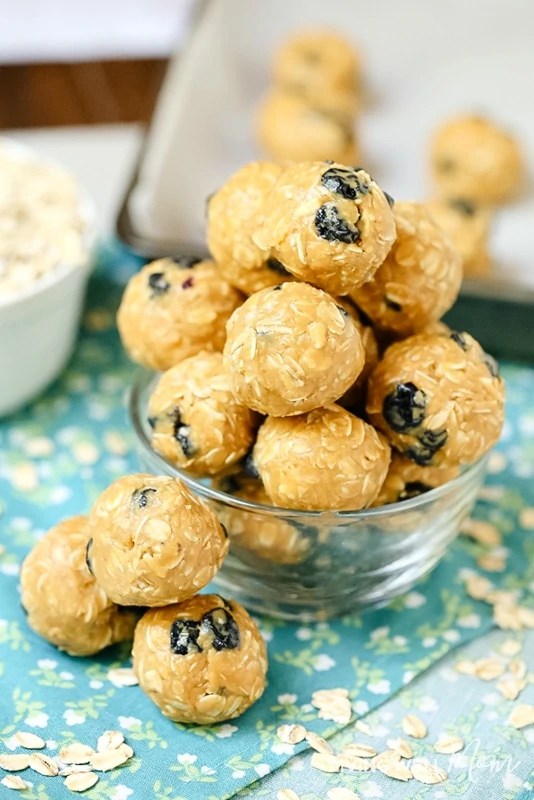 blueberry snack balls in a glass bowl