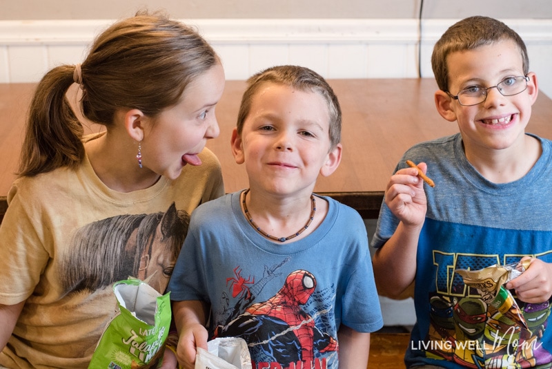 kids enjoying their bags of snack mix