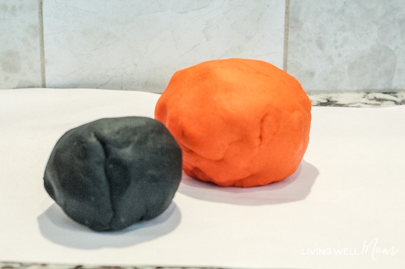 orange and black balls of DIY Halloween playdough