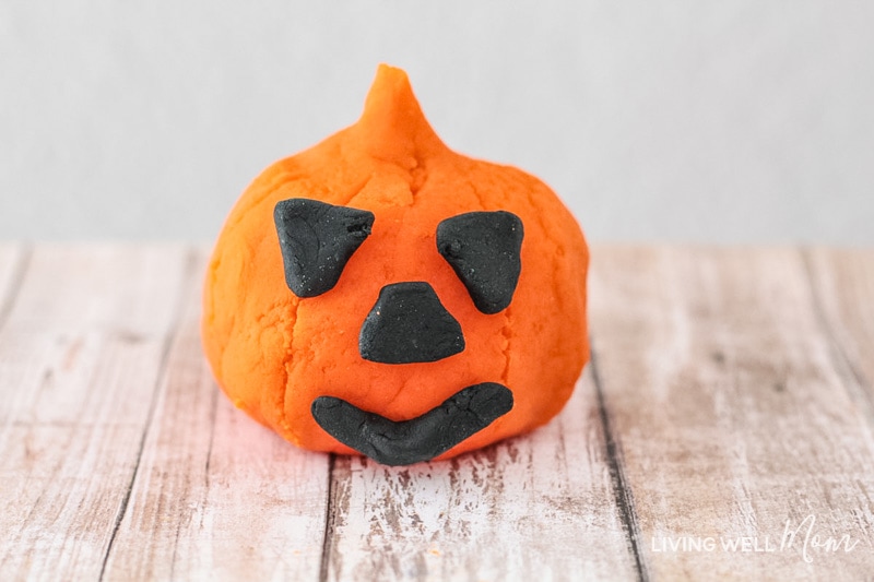 pumpkin made out of orange and black dough