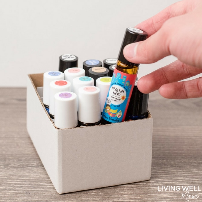 This simple solution for organizing essential oil roller bottles is genius! It's practically free, doesn't require any DIY talent, and works perfectly for keeping roller bottles stored upright with convenient, easy-to-find access.