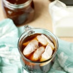 If you like pumpkin spice, you’ll love this easy homemade pumpkin spice iced coffee recipe with a fabulous homemade pumpkin spice syrup! It’s simple to make and you can save the syrup to use again and again for your favorite fall beverage.