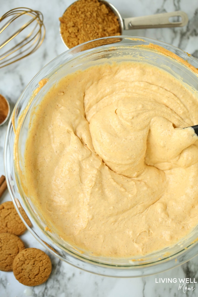 batter for whipped pumpkin spice mousse in a glass mixing bowl