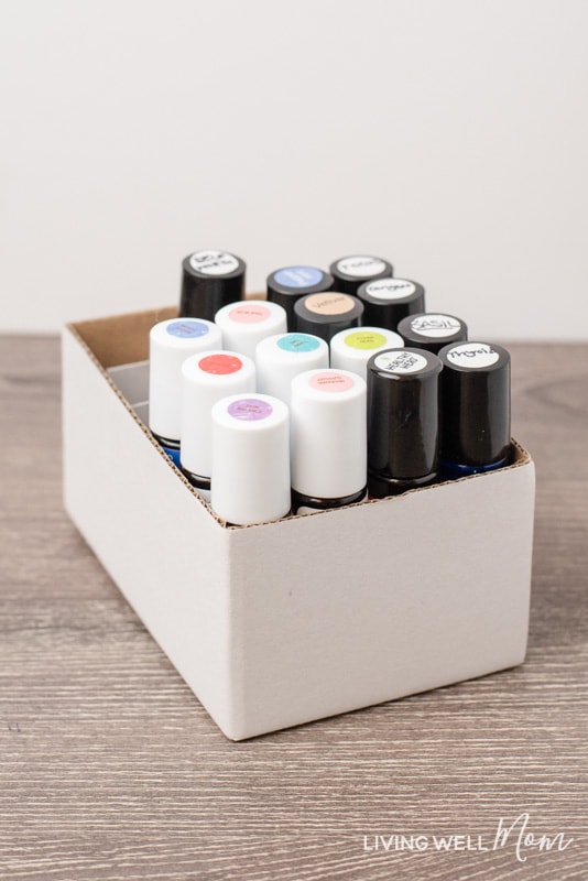 This simple solution for organizing essential oil roller bottles is genius! It's practically free, doesn't require any DIY talent, and works perfectly for keeping roller bottles stored upright with convenient, easy-to-find access.