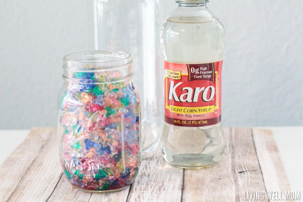 Kids of all ages love this Rainbow Sensory Bottle! It's calming for kids with autism and also works well as a timer or distraction for young children. Find out how to make your own with the easy DIY instructions here. 