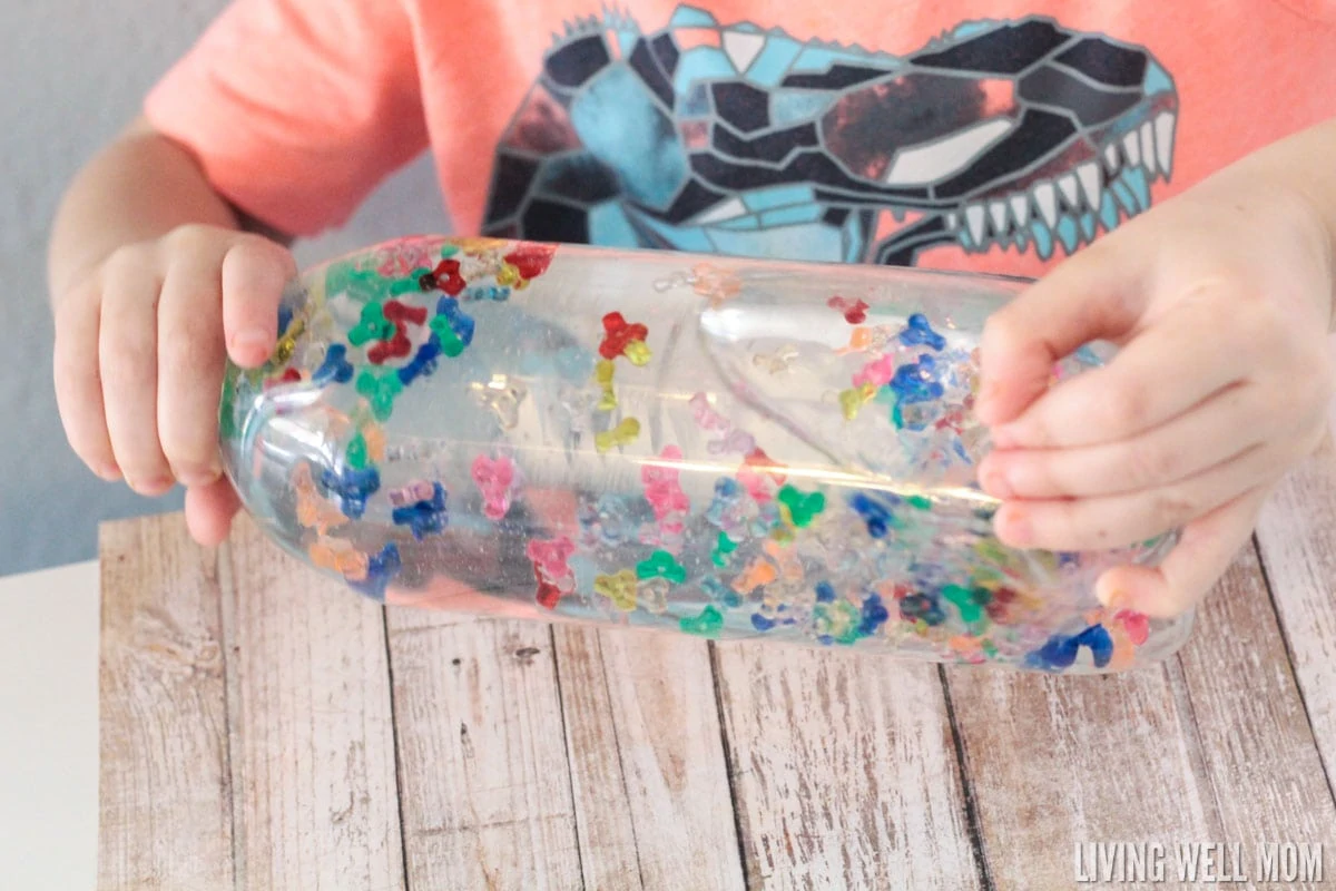 Kids of all ages love this Rainbow Sensory Bottle! It's calming for kids with autism and also works well as a timer or distraction for young children. Find out how to make your own with the easy DIY instructions here. 