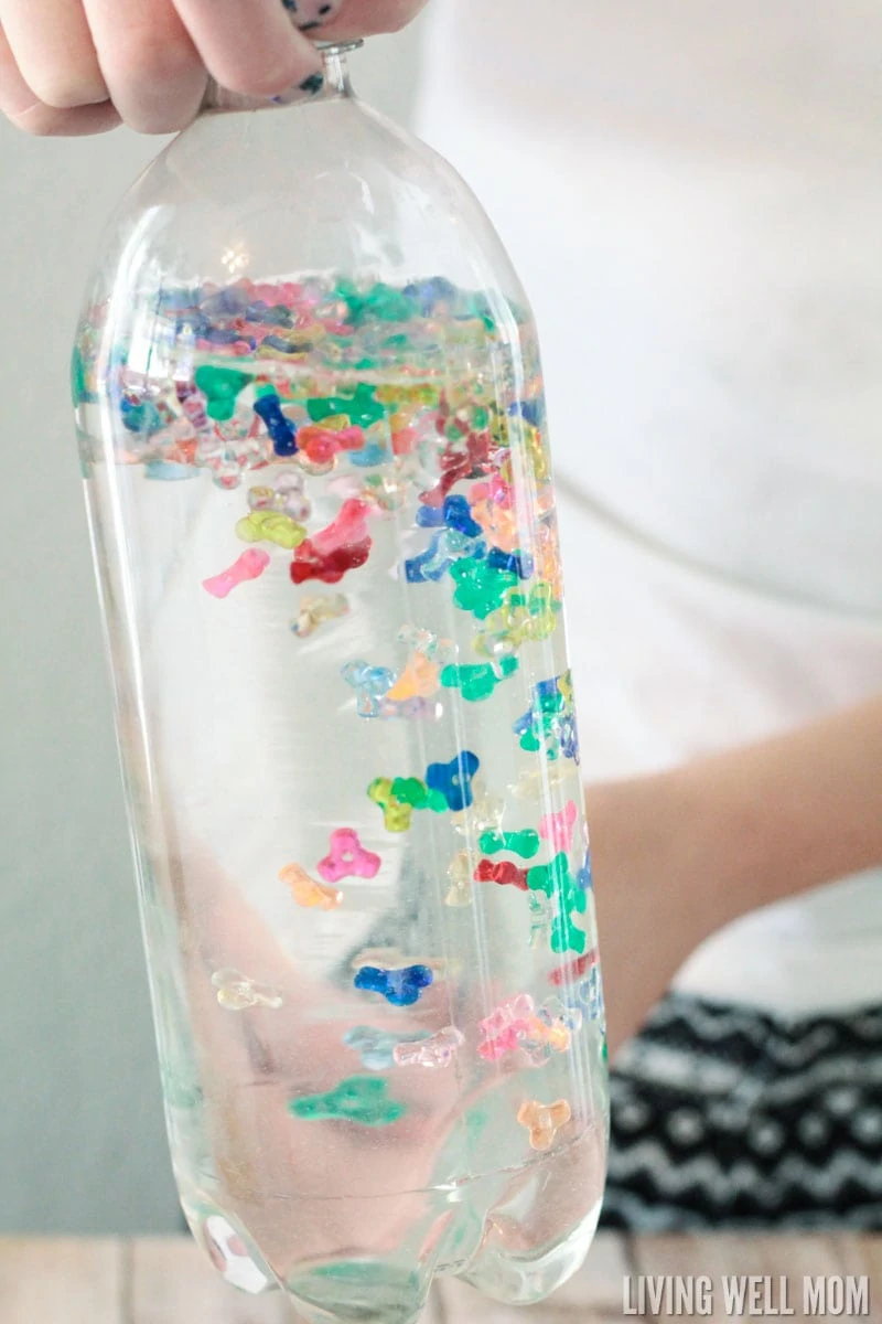 Kids of all ages love this Rainbow Sensory Bottle! It's calming for kids with autism and also works well as a timer or distraction for young children. Find out how to make your own with the easy DIY instructions here. 