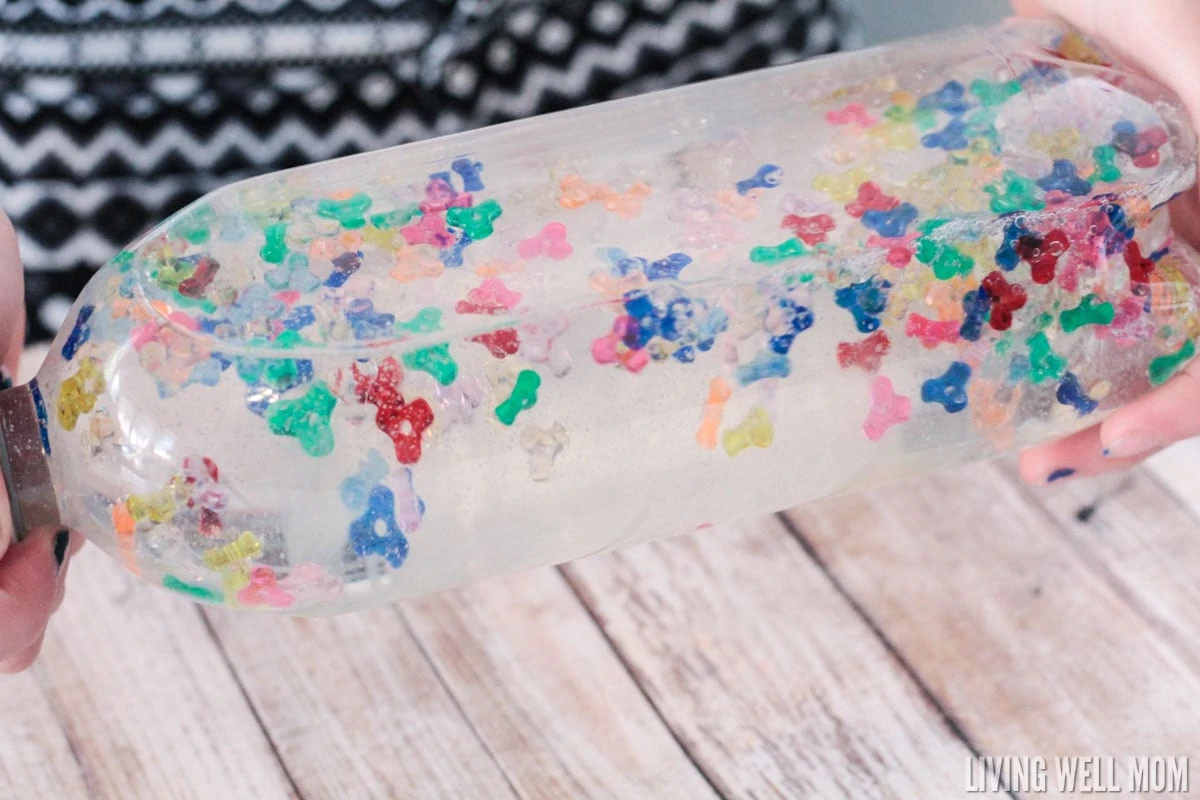 Kids of all ages love this Rainbow Sensory Bottle! It's calming for kids with autism and also works well as a timer or distraction for young children. Find out how to make your own with the easy DIY instructions here. 