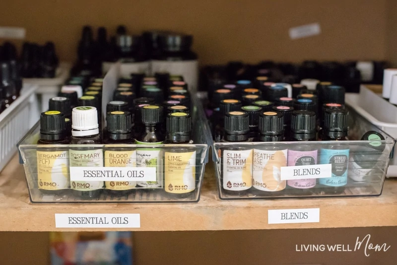 essential oil bottles in a clear plastic container