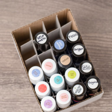 This simple solution for organizing essential oil roller bottles is genius! It's practically free, doesn't require any DIY talent, and works perfectly for keeping roller bottles stored upright with convenient, easy-to-find access.