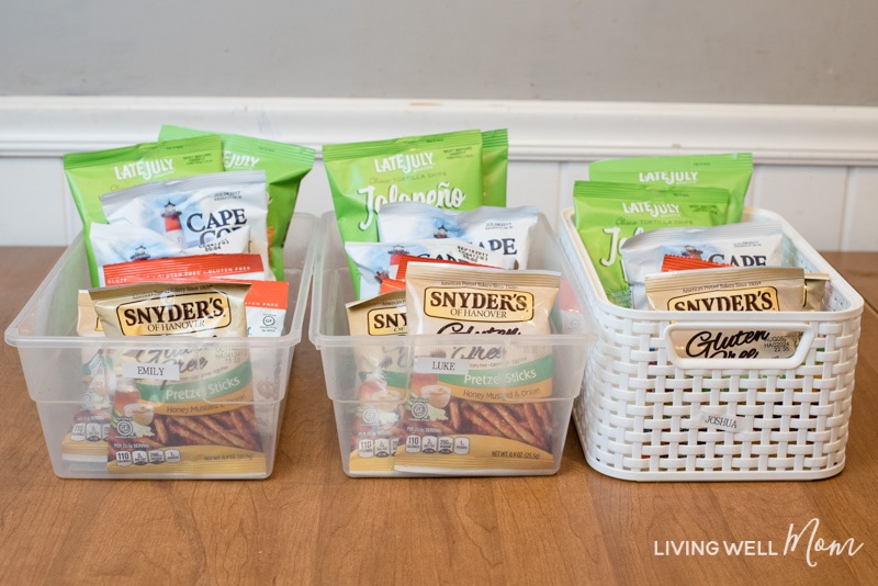 snack bins with bags of snack packs to pack in school lunches