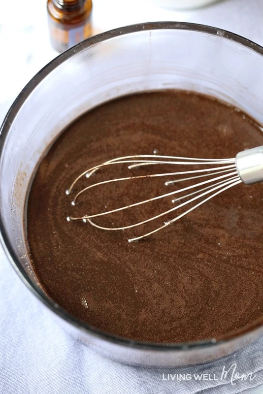 mixing melted chocolate mixture for keto fat bombs recipe