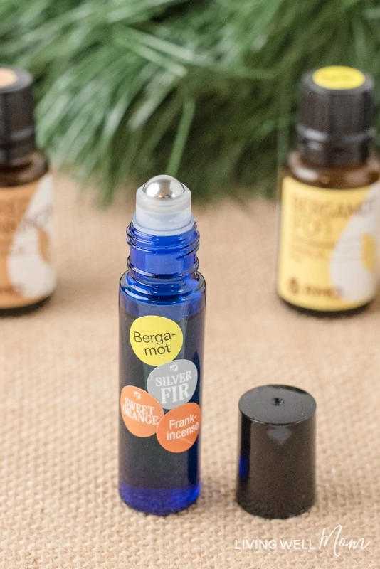 This Holiday Calming Essential Oil Blend can bring back the joy this Christmas. It may help uplift your mood, reduce stress levels, relax, and improve brain fog. (Moms love it!) Get the easy DIY blend here...