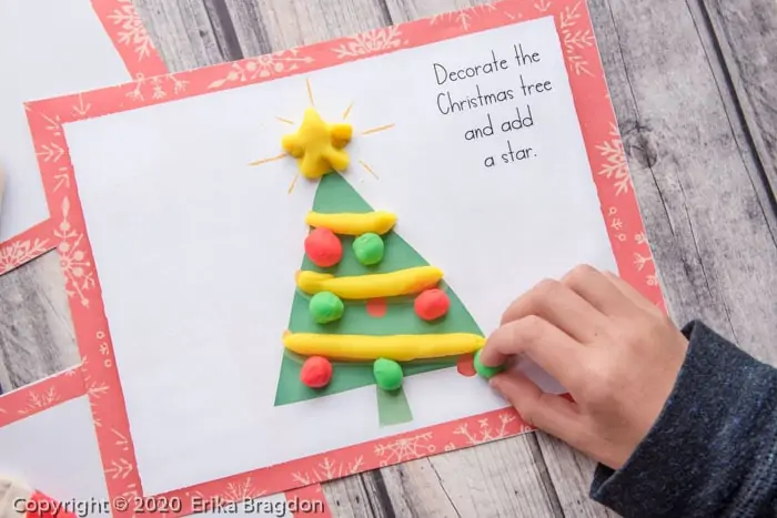 decorating a playdough christmas tree