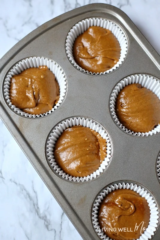 gingerbread muffin batter in muffin pan