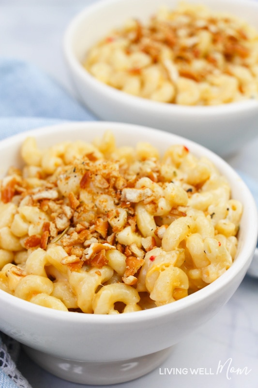 A bowl of gluten-free mac and cheese with pretzel topping.