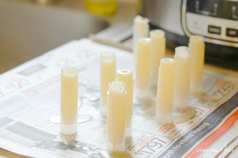 empty chapstick tubes filled with DIY bug bite relief stick