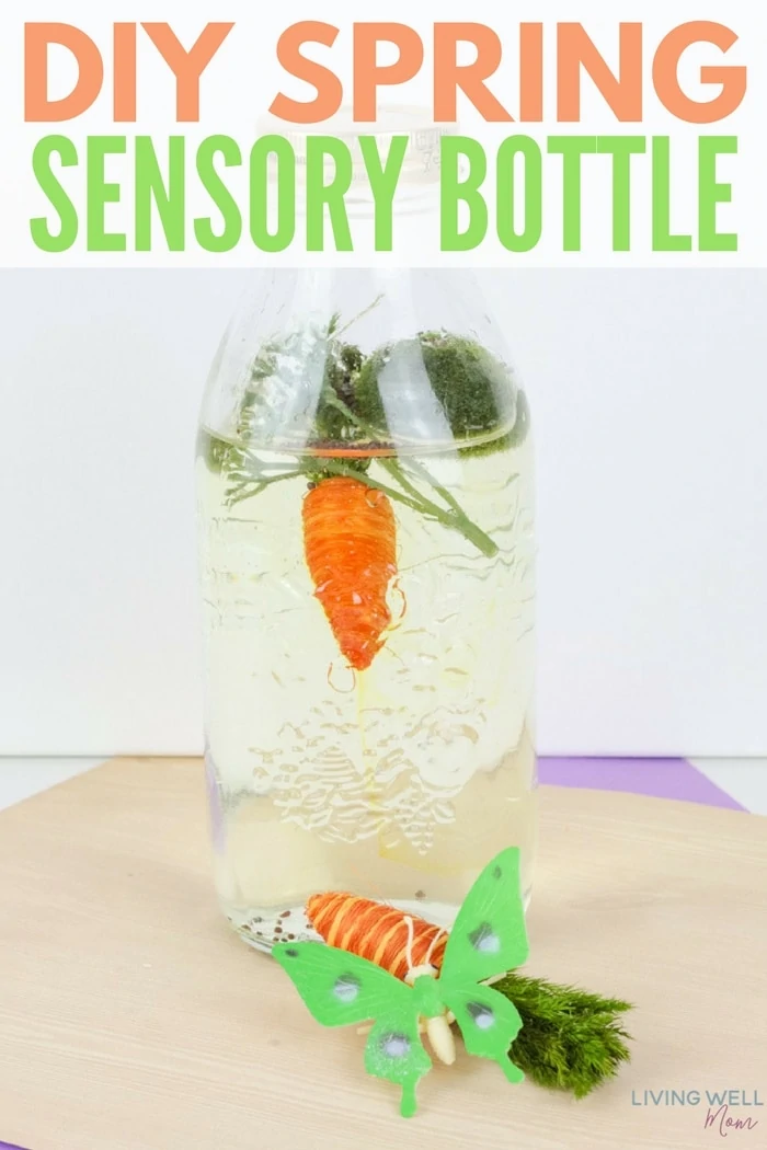 A DIY sensory bottle filled with spring-themed items
