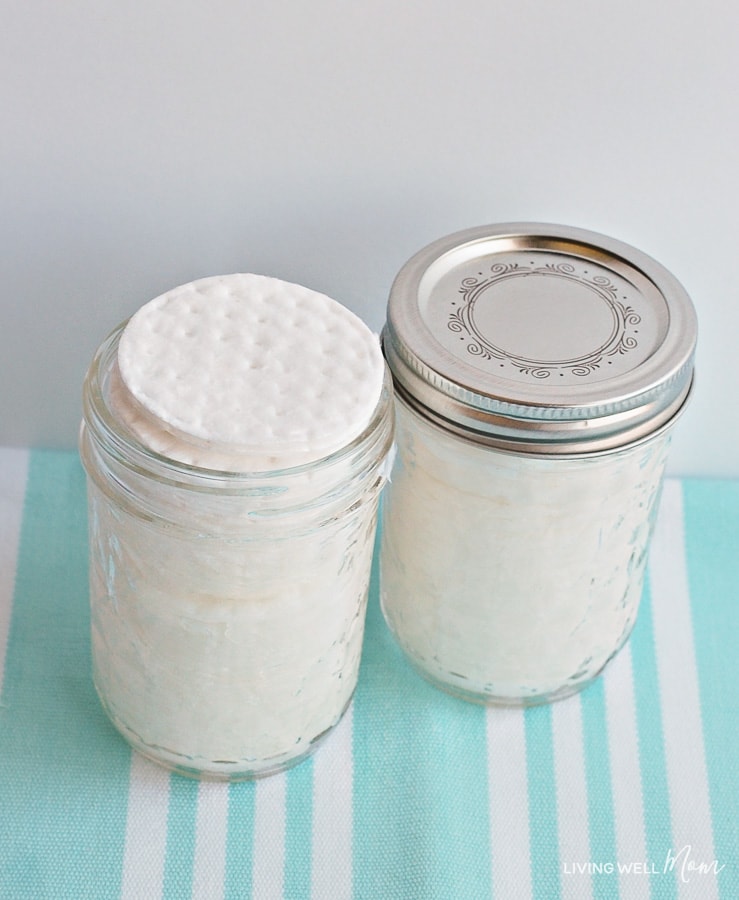 Two jars of DIY facial toning wipes, one with lid and one without.