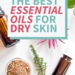 essential oil bottles and flowers for dry skin