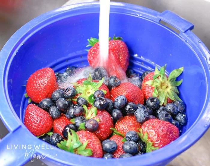 Washing berries with water and DIY vegetable wash.