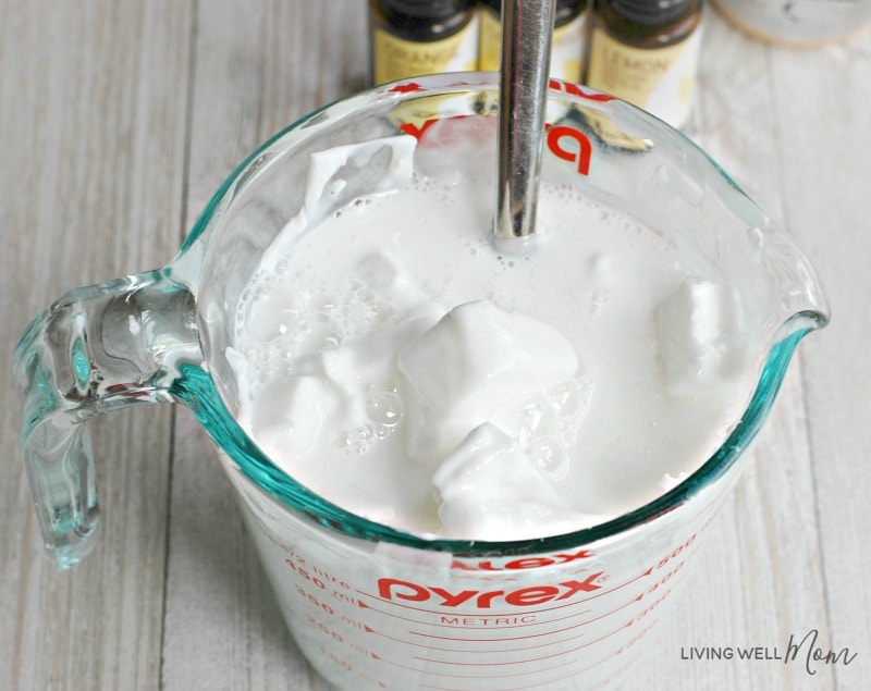 ingredients being mixed together to make homemade goat milk soap