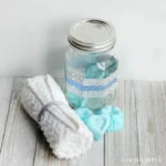 DIY peppermint &lemon essential oil shower melts in a glass container